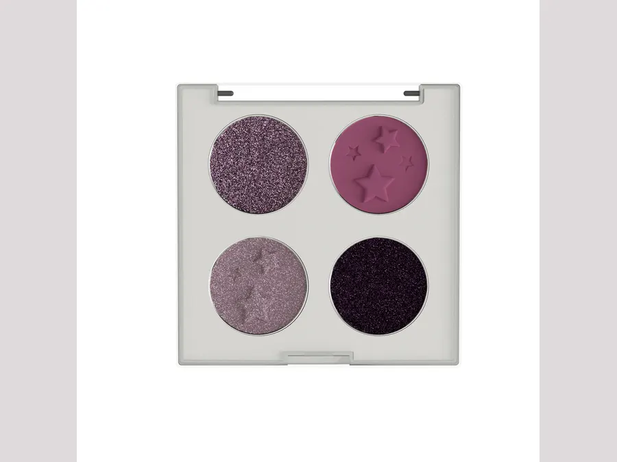 An open four pan eyeshadow palette with pressed and glitter shades.